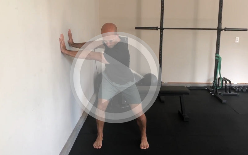 Athletic Stance T-Spine Wall Press